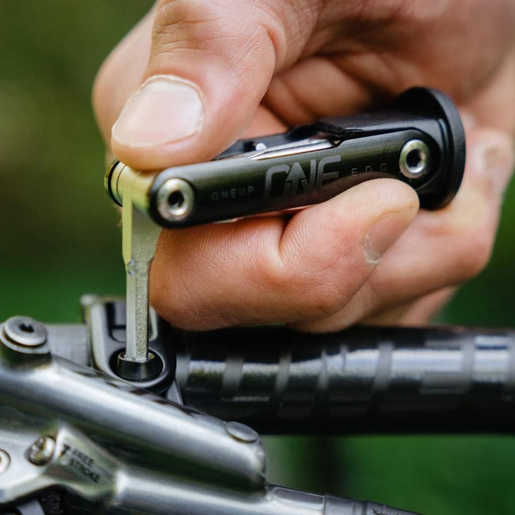 OneUp Components EDC Lite Multitool In Use