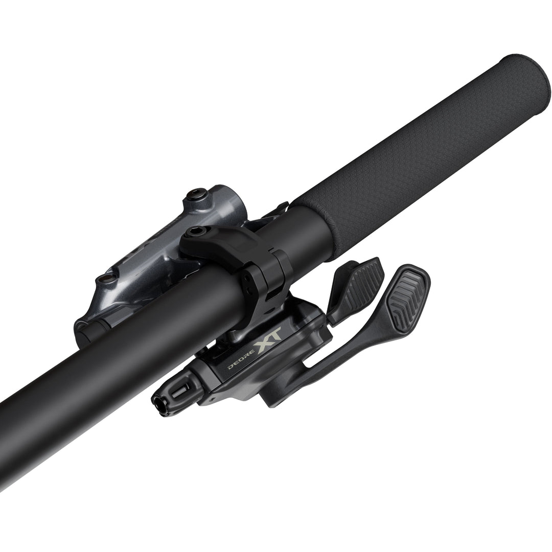 A black Shimano Deore XT 11 Speed Linkglide mountain bike gear shift lever with handlebar clamp fitted.