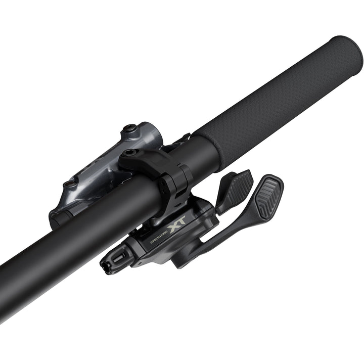 A black Shimano Deore XT 11 Speed Linkglide mountain bike gear shift lever with handlebar clamp fitted.